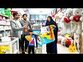 Going to buy different colored clothes for the baby by Akbar and his wife Fatemeh