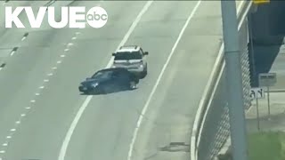 SUV tows vehicle backwards in Houston