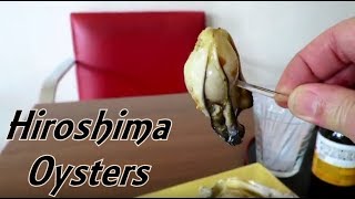 Oyster eating at Miyajima Island in Hiroshima Japan
