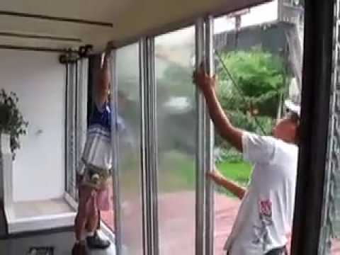 installing glass doors for shipping container home, a
