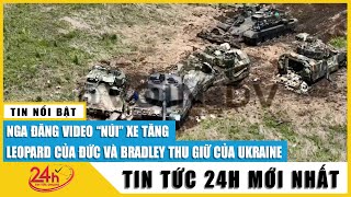 Nga tung video khoe 'núi' xe tăng Leopard, xe bọc thép Bradley vừa tóm được từ Ukraine | TV24h