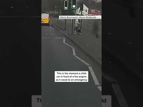 Close call as child runs in front of fire engine