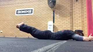 Lying Hip Extensions w Straddle Hold