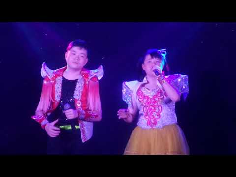 歌星：陈建強与陈美芯：合唱歌曲：伤心酒店。