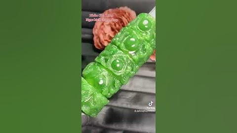 Nhẫn càn long ngọc bích chạm rồng