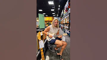 When You Play This Forbidden Riff in a Guitar Store