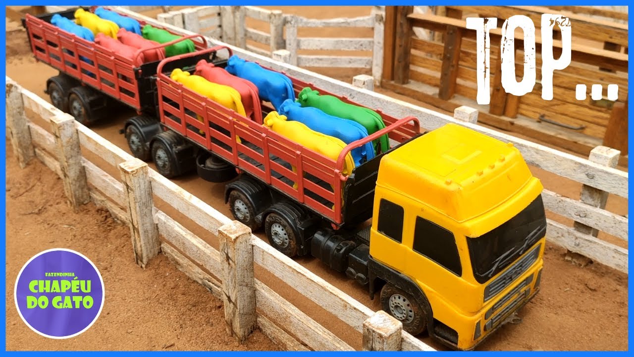 Fazenda de Brinquedo CHEGOU OS BOIS COLORIDOS NO CAMINHÃO BITREM