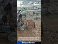 DIY Mini Excavator: Woman Operates Homemade Machine to Move Dirt