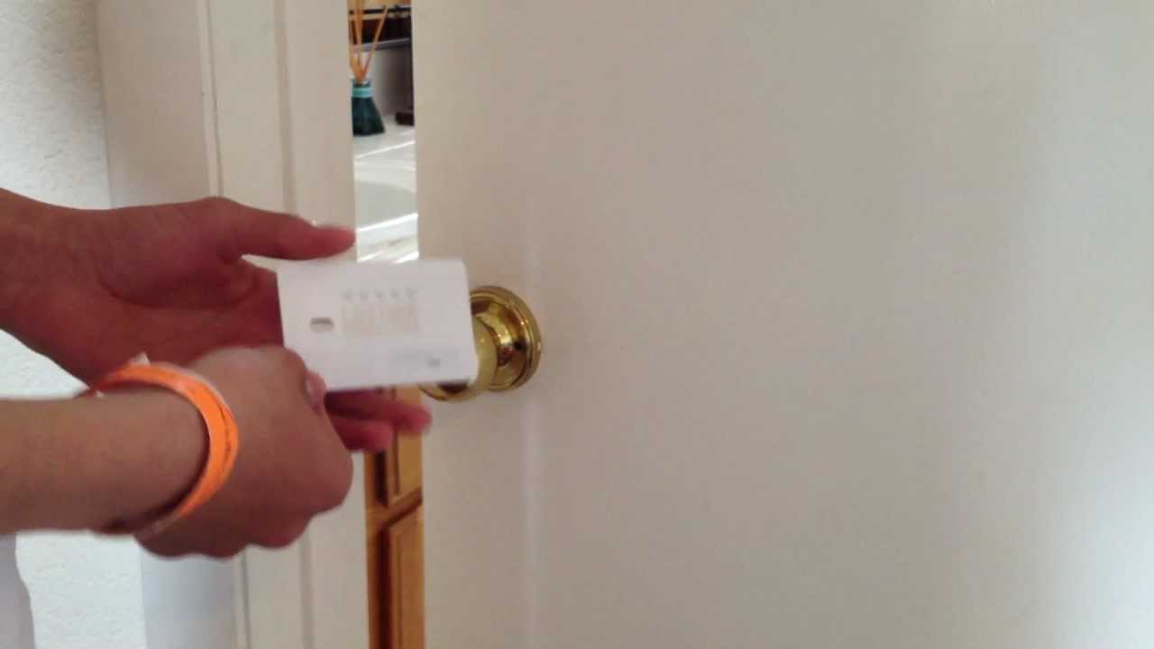 Pick a door lock with a plastic card - YouTube