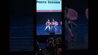 John Cena and a fan do the Peacemaker opening dance number at Comic Con In Wales