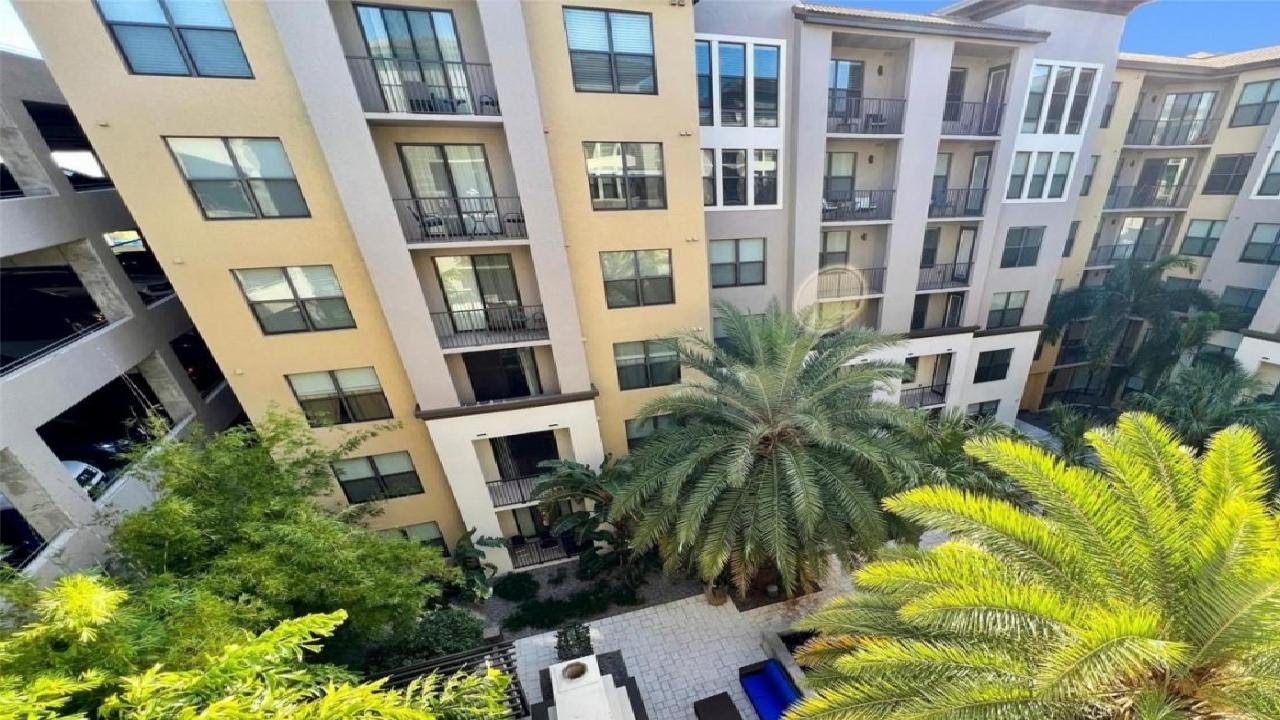 4504 W SPRUCE STREET, TAMPA, FL Presented by John Rurkowski.