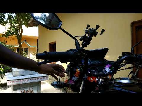 Honda Shine SP smart phone holder with mobile phone charger and installing process. Honda Shine SP smart phone holder with mobile phone charger and installing process.