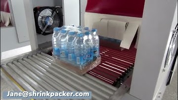 Shrink wrapping machine for water bottles with tray