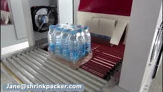 Shrink wrapping machine for water bottles with tray