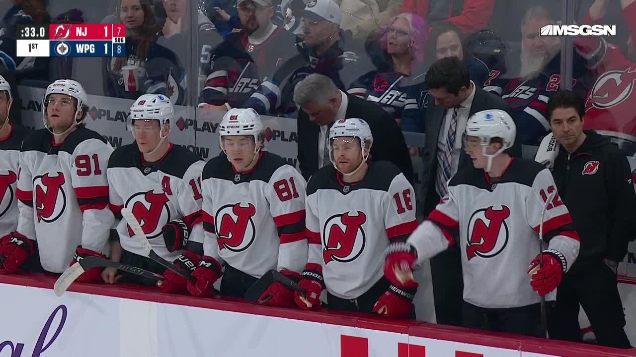 Nico Hischier scores a goal against the Winnipeg Jets