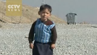 Five-year-old photographed wearing 'messi 10' plastic bag