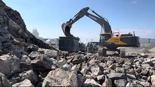 : Volvo 530 is back!! feeding Jonsson 1208 jaw crusher. Doosan 550 wheel loader drive stones in piles.