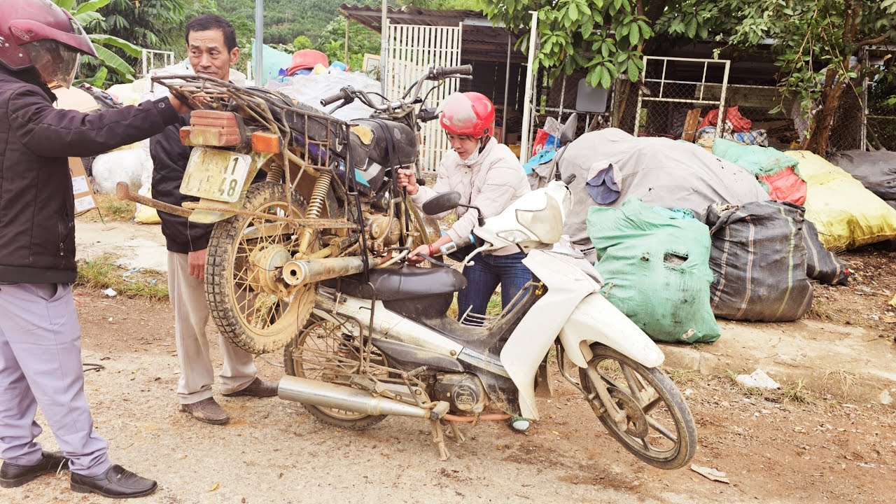 The girl bought a motorbike from a scrap metal place to fix it for her family.