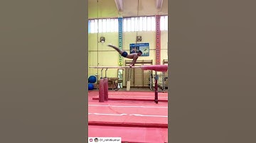 Front turn handstand (parallel bar)