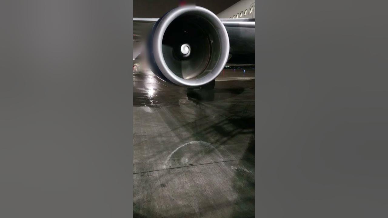 B767 Jet engine idle run in the rain with beautiful vortex created