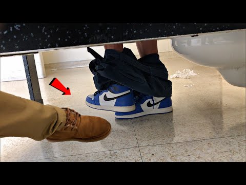 footsies-in-highschool-bathroom-prank