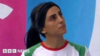 Iran climber Elnaz Rekabi who competed without hijab &#39;says it fell off accidentally’ - BBC News