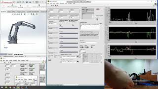 Real-time simulation of a robot arm using Solidworks and LabVIEW, with a force sensor as the control