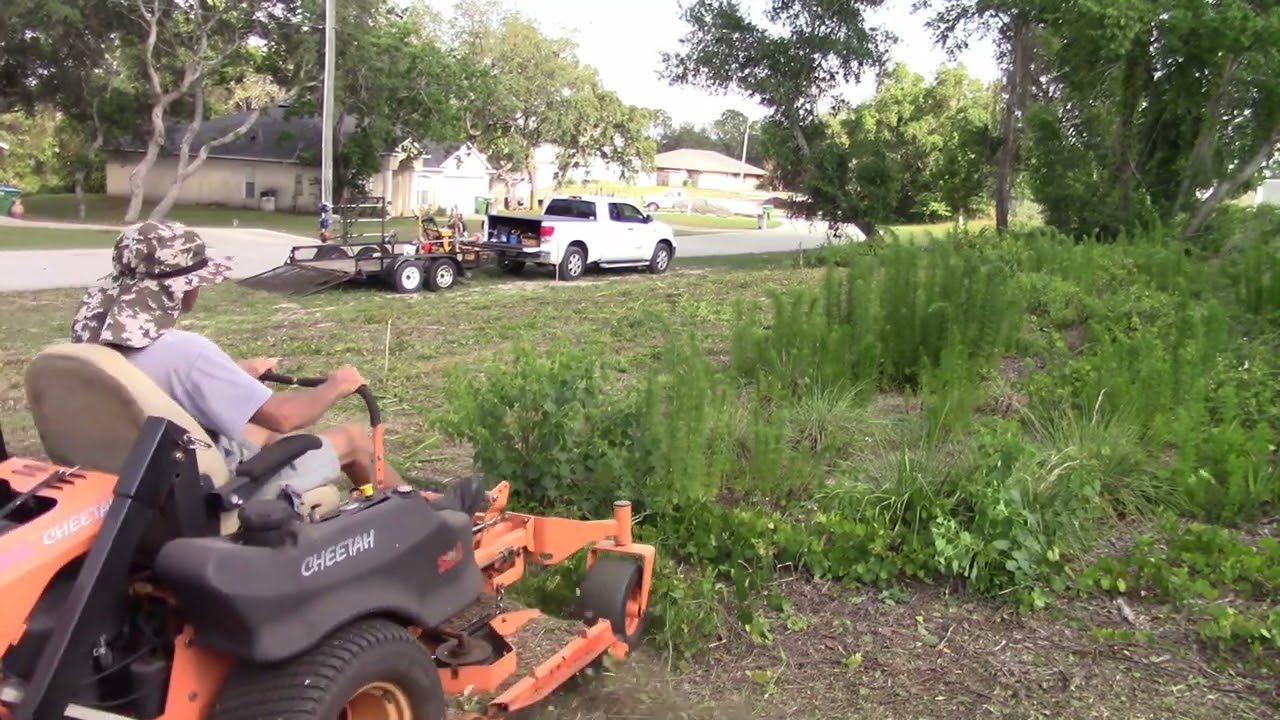 Mowing an Overgrown Hillside with the Scag Cheetah - New video!