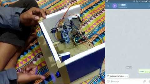 Security Door Berbasis Fingerprint dan Telegram