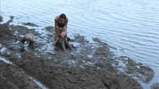 Grand kids having fun in the Mud