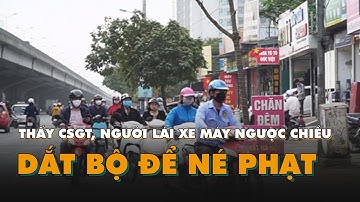 Thấy CSGT, người lái xe máy ngược chiều dùng “chiêu” dắt bộ để né phạt