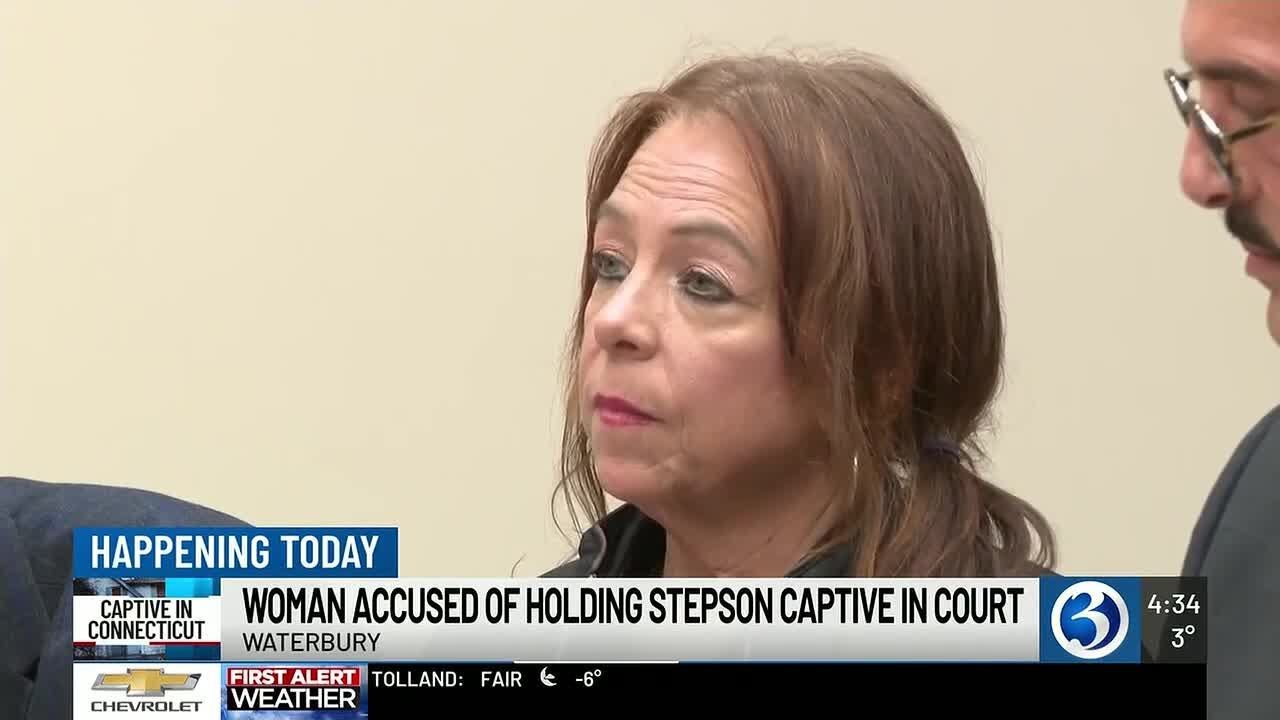 Woman accused of holding stepson captive for 20 years returns to court