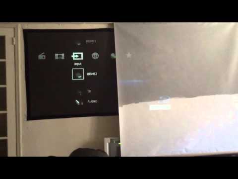How does a black projector screen work 