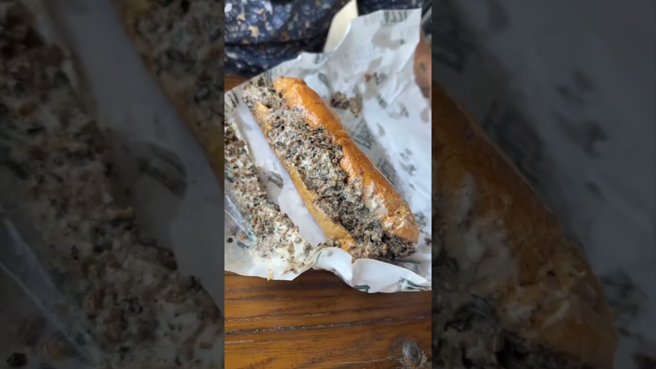 Porcini mushroom rubbed prime rib CHEESESTEAK from Fugazzi in Charleston, SC! 🧀🔥🤤 #DEVOURPOWER