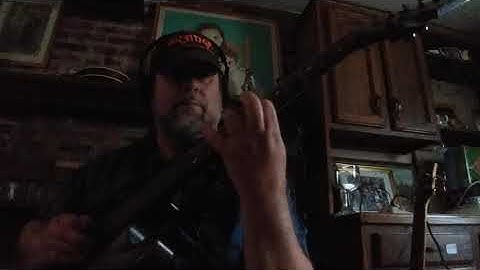 Paul Lingerman playing Yngwieish shred with heavy delay on 7 string Schecter guitar!