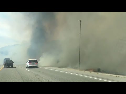 Wildfire Closely Visible From Highway In California