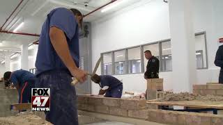 Governor tours job training program in Jackson prison