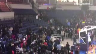 Fan brawl breaks out after basketball game screenshot 5