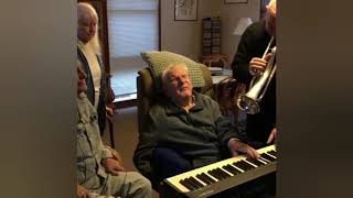 Elderly Man Plays Piano