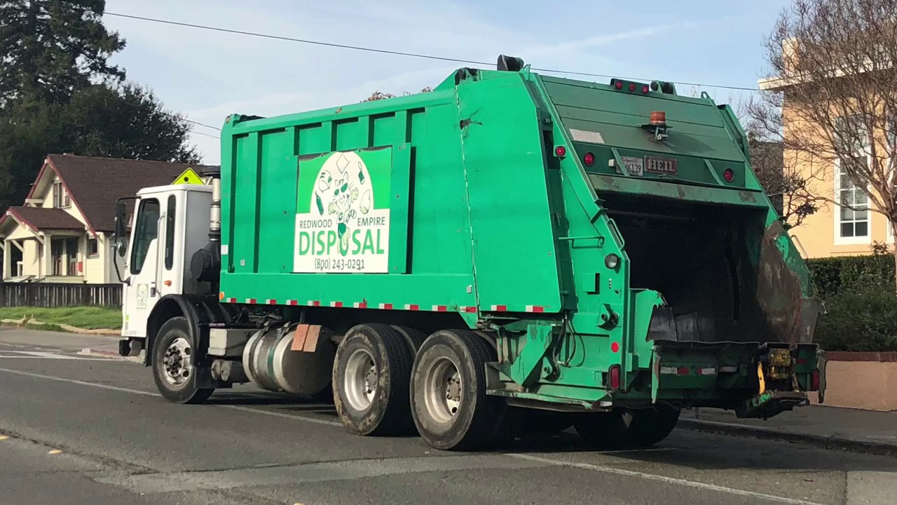 Heil 5000 Garbage Truck Eating Christmas Trees YouTube