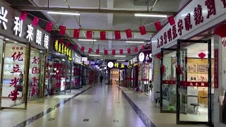 China services growth slows as inflation rises