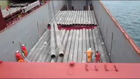crane swinging load inside ship