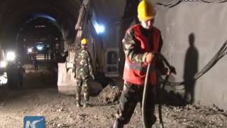 China completes 16-km train tunnel