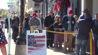 Voters wait in long lines to cast absentee votes in Missouri