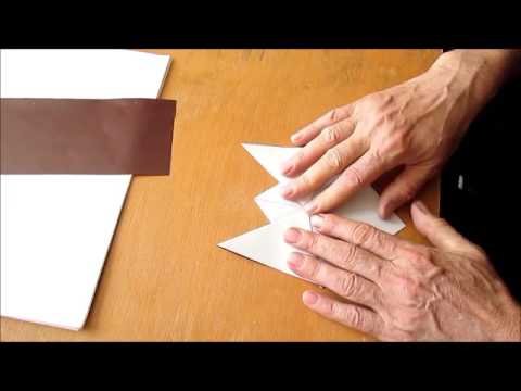 Wideo: Jak Zrobić Papierowy Hełm