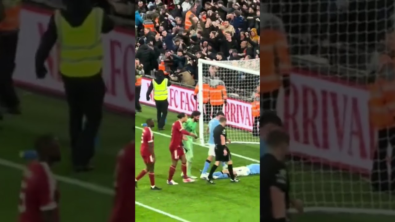 CHAOS AT ANFIELD: Liverpool Stewards Tackle Man City Pitch Invader!