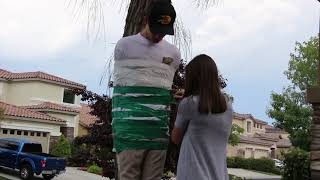 TAPING MYSELF TO A TREE