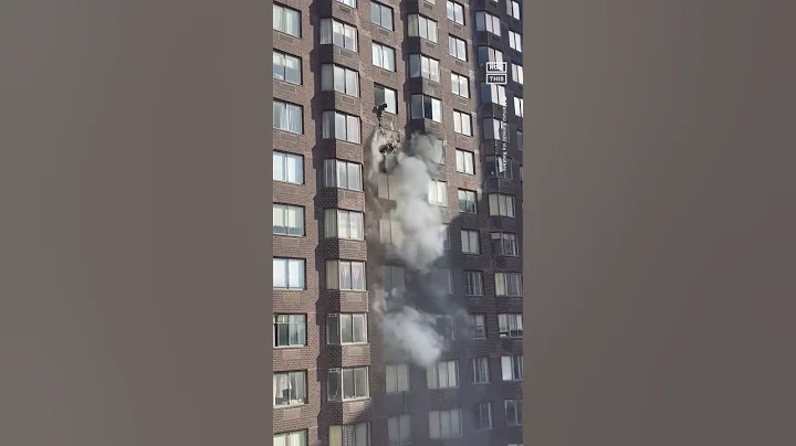 NY Firefighters Save Woman Hanging Outside 20-Stor...