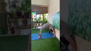 Standing Chakrasana using wall as prop #shorts #yogawellness