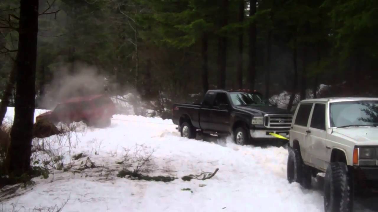 XJ Pulling a F-350 Pulling another XJ outa the snow. - YouTube